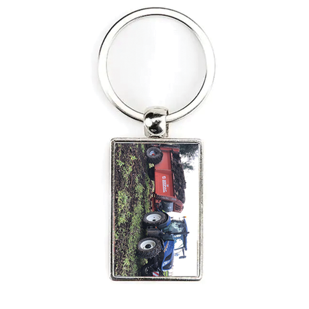 Tractor key ring with spreader